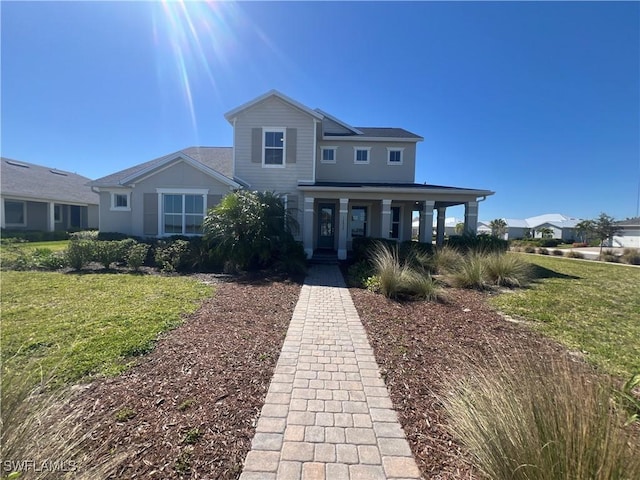 view of front of property featuring a front lawn