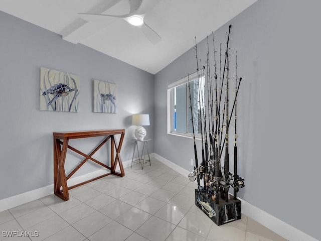 interior space featuring tile patterned floors, baseboards, and ceiling fan