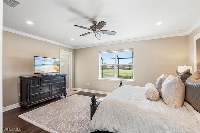 bedroom with baseboards, visible vents, dark wood finished floors, recessed lighting, and ornamental molding