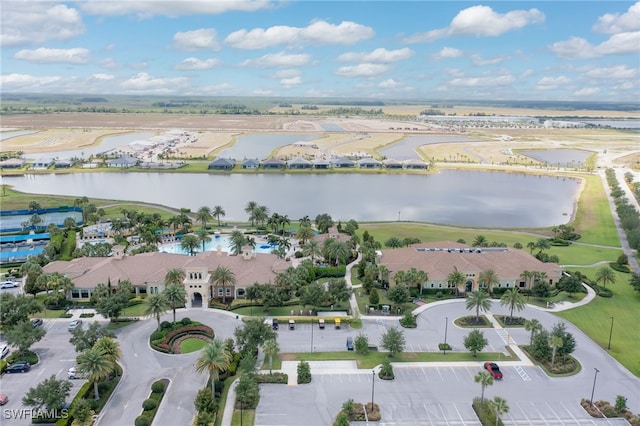 birds eye view of property featuring a residential view and a water view