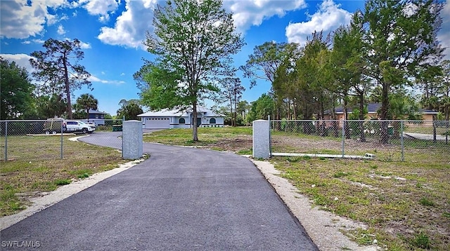 view of road featuring driveway