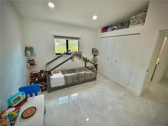 bedroom featuring recessed lighting