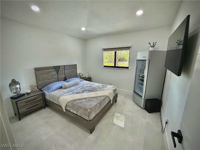 bedroom with recessed lighting and baseboards