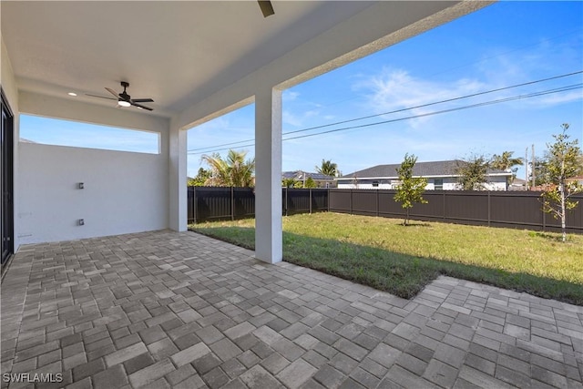 view of patio / terrace featuring a fenced backyard and ceiling fan