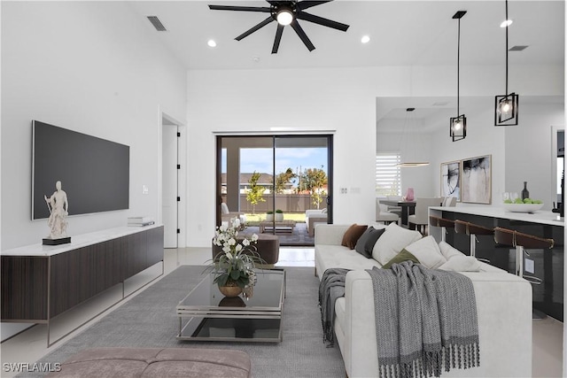 119 Kismet Pkwy E, Cape Coral, FL 33909 - living room with visible vents, recessed lighting, ceiling fan, and a healthy amount of sunlight