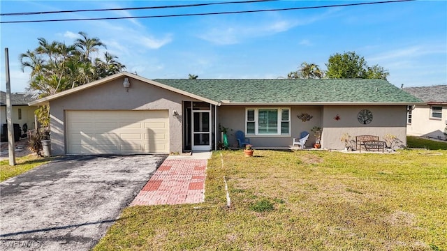 ranch-style home with stucco siding, driveway, a shingled roof, a front yard, and an attached garage