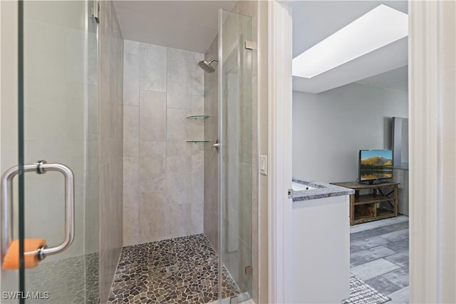 bathroom featuring a shower stall