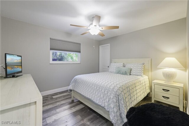 15910 Lake Candlewood Dr Unit 15910, Fort Myers, FL 33907 - bedroom featuring a ceiling fan, baseboards, and wood finished floors