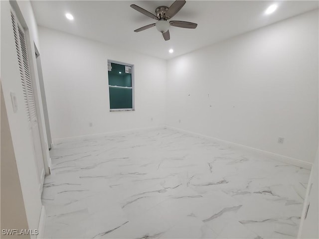 unfurnished bedroom featuring recessed lighting, baseboards, and marble finish floor