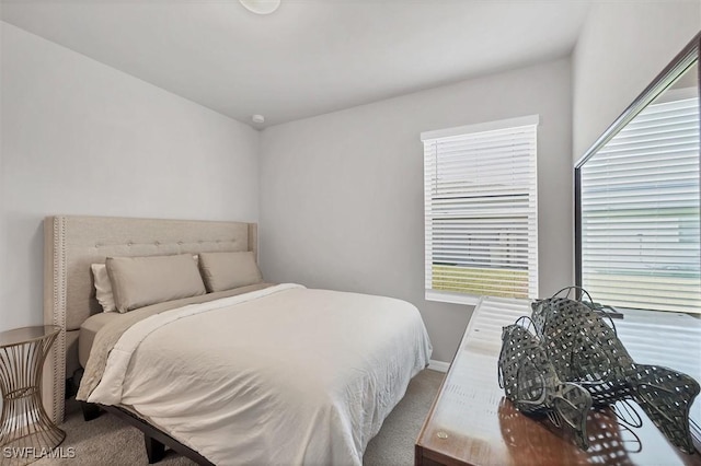 bedroom featuring carpet flooring