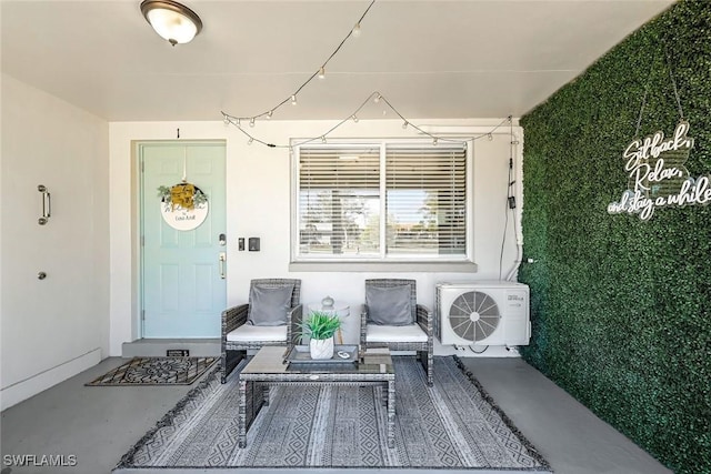 doorway to property featuring stucco siding and ac unit
