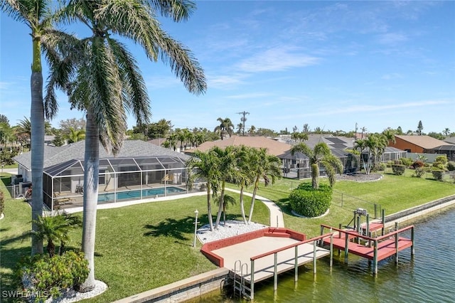 view of dock featuring a residential view, glass enclosure, a yard, and a water view