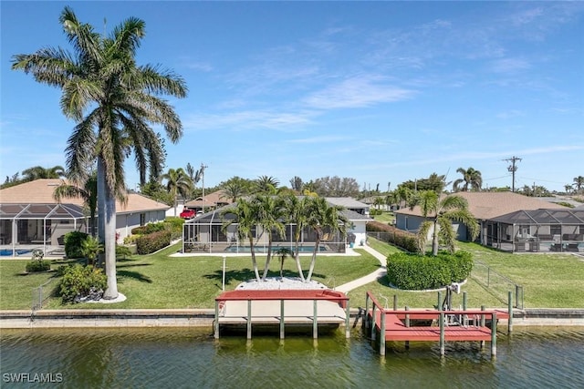 view of dock featuring a water view, a yard, a residential view, glass enclosure, and boat lift