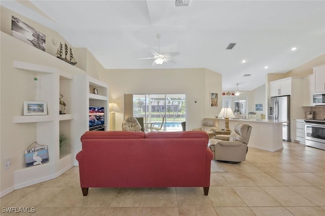 living room featuring built in shelves, lofted ceiling, light tile patterned flooring, recessed lighting, and ceiling fan