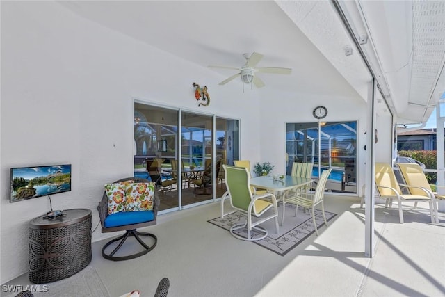 view of patio / terrace featuring outdoor dining space and a ceiling fan