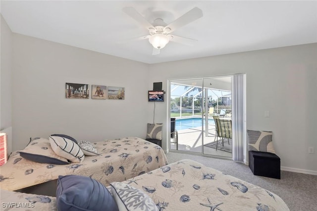 carpeted bedroom with access to exterior, baseboards, a sunroom, and ceiling fan