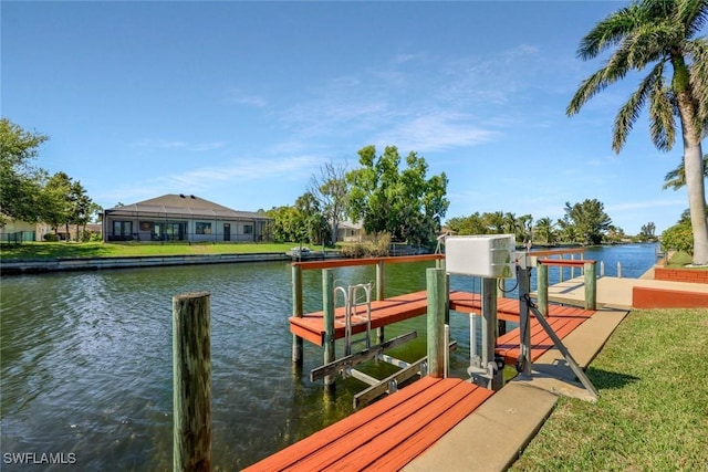 dock area with a water view and boat lift