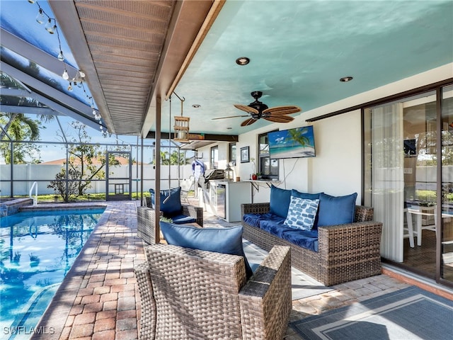 view of patio / terrace featuring a ceiling fan, fence, a fenced in pool, an outdoor living space, and a lanai