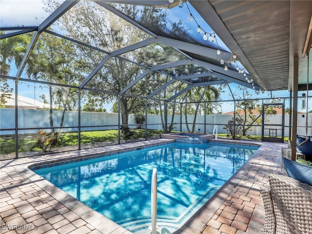 view of swimming pool with a patio and a fenced backyard