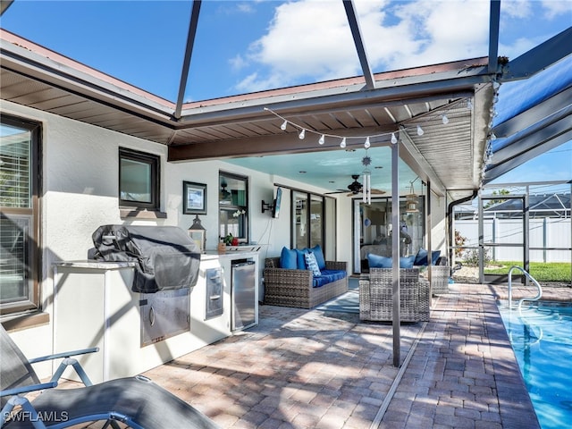 view of patio / terrace featuring an outdoor living space, an outdoor pool, a lanai, and fence