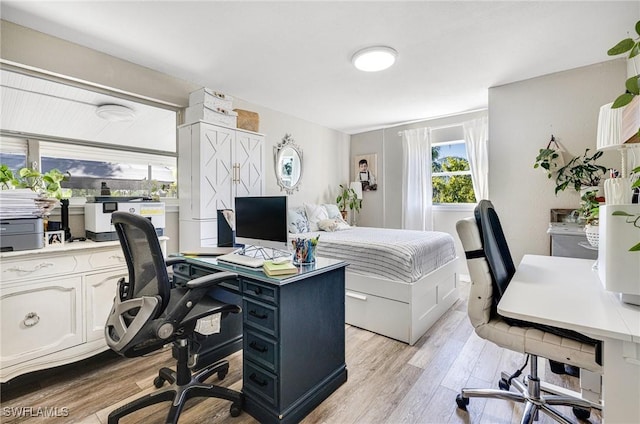 office area featuring light wood finished floors