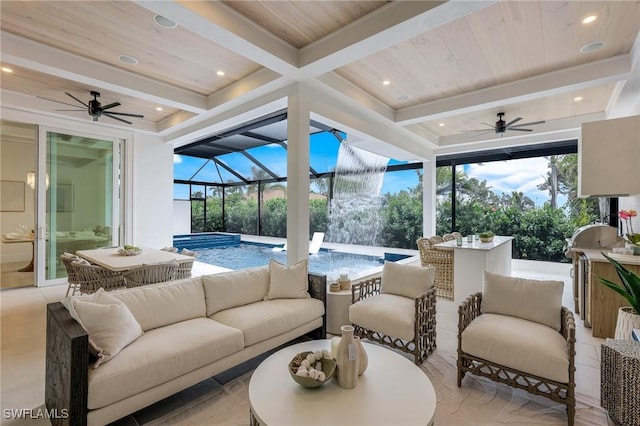 living area with beamed ceiling, a healthy amount of sunlight, and a sunroom