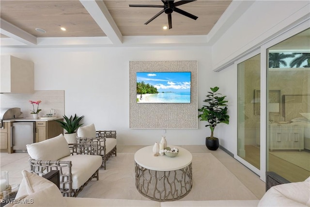 living room featuring light tile patterned floors, a ceiling fan, recessed lighting, wooden ceiling, and beamed ceiling