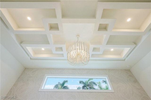 details featuring recessed lighting, coffered ceiling, and a chandelier