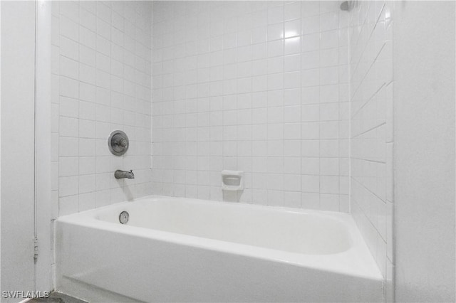 full bathroom with a bath and walk in shower