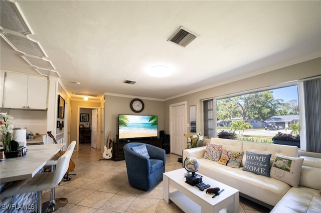 1862 Moreno Ave, Fort Myers, FL 33901 - living area featuring crown molding, light tile patterned floors, and visible vents
