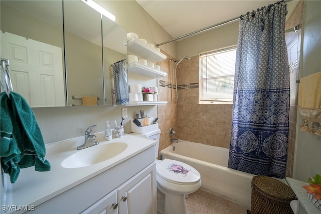 1862 Moreno Ave, Fort Myers, FL 33901 - full bathroom featuring tile patterned flooring, shower / tub combo with curtain, vanity, and toilet