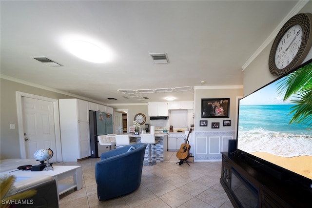 1862 Moreno Ave, Fort Myers, FL 33901 - living area featuring a decorative wall, visible vents, crown molding, and light tile patterned flooring