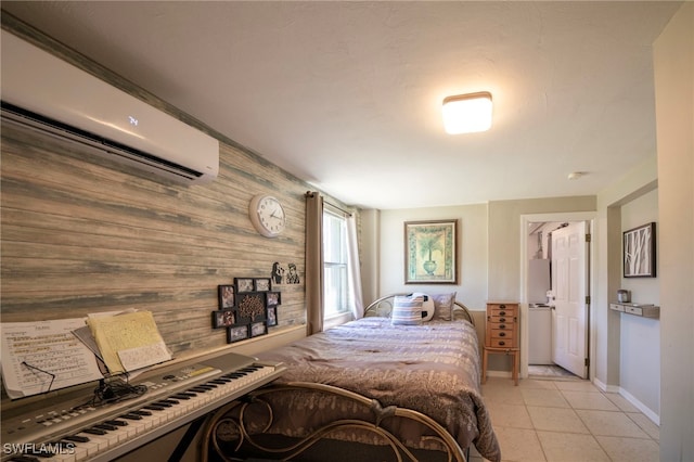 1862 Moreno Ave, Fort Myers, FL 33901 - bedroom featuring a wall mounted air conditioner, baseboards, wood walls, and light tile patterned floors