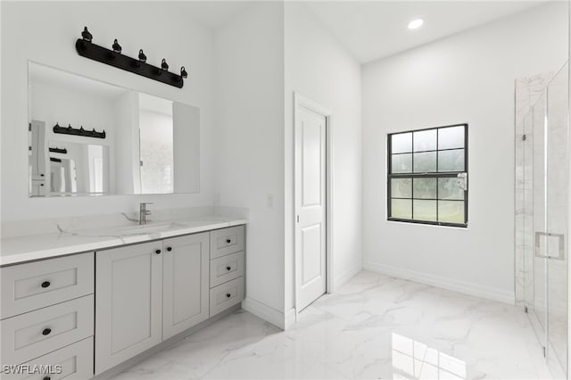 bathroom with vanity, baseboards, marble finish floor, and a stall shower