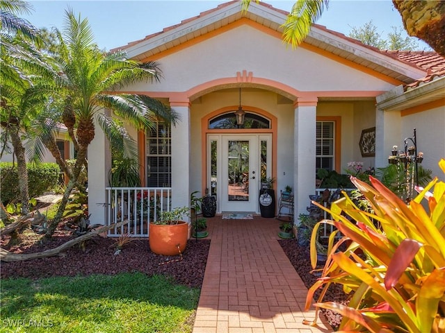 2030 Rio Nuevo Dr, North Fort Myers, FL 33917 - entrance to property with stucco siding and a porch