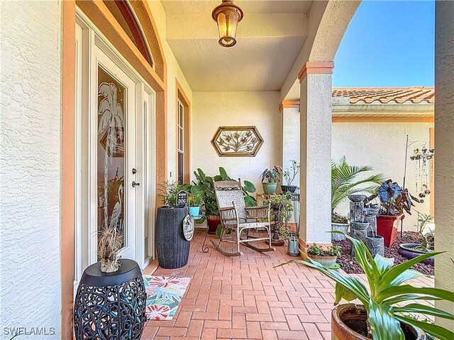 2030 Rio Nuevo Dr, North Fort Myers, FL 33917 - view of exterior entry featuring stucco siding