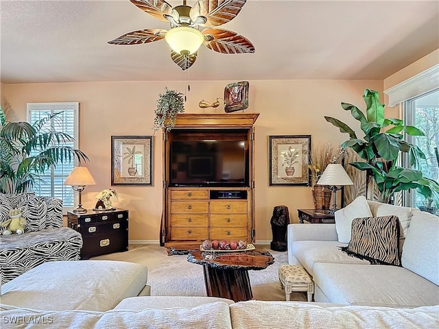 2030 Rio Nuevo Dr, North Fort Myers, FL 33917 - living area featuring carpet, a ceiling fan, and baseboards