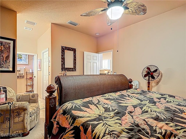 2030 Rio Nuevo Dr, North Fort Myers, FL 33917 - carpeted bedroom with a ceiling fan and ensuite bath