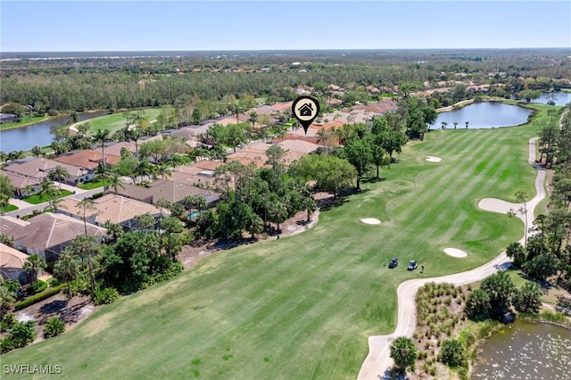 birds eye view of property featuring a water view and golf course view