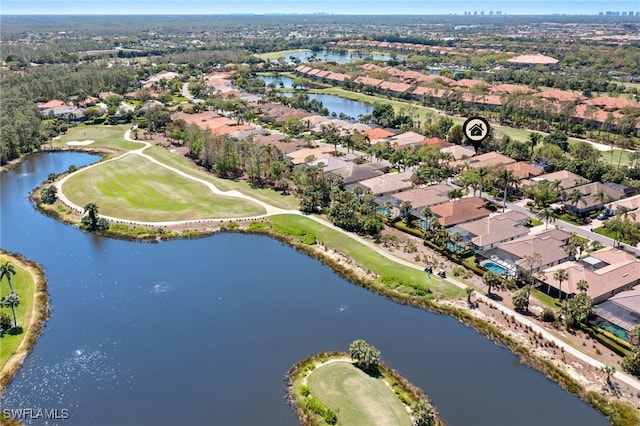 drone / aerial view with a residential view, view of golf course, and a water view