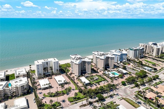 drone / aerial view with a view of city and a water view