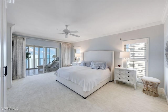 bedroom with light carpet, a ceiling fan, crown molding, baseboards, and access to exterior