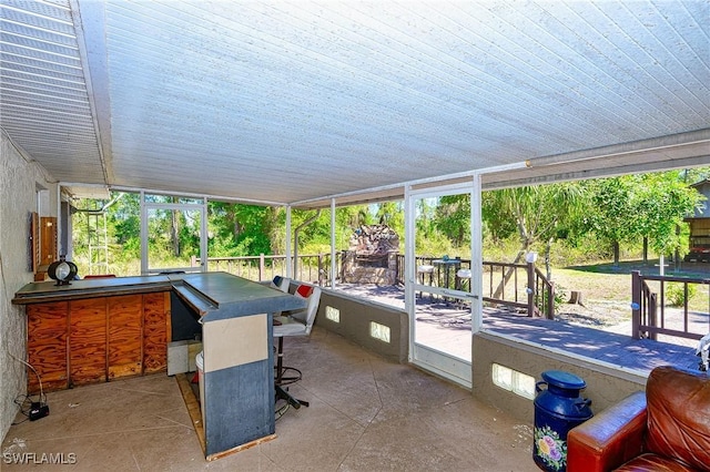 view of patio / terrace featuring exterior kitchen and outdoor dry bar