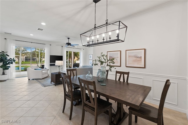 dining area with visible vents, a wainscoted wall, light tile patterned flooring, recessed lighting, and a decorative wall