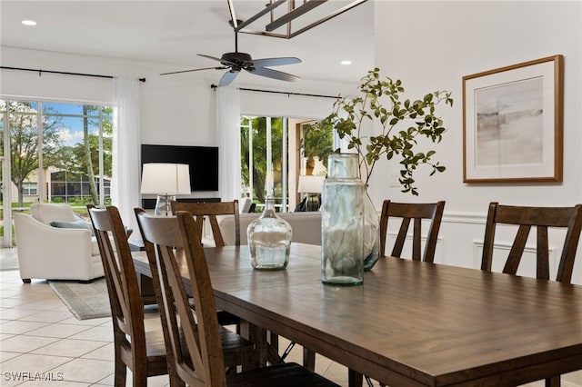 dining space featuring a ceiling fan, plenty of natural light, recessed lighting, and light tile patterned floors