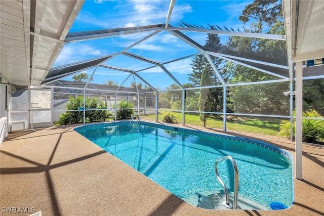 pool featuring a lanai and a patio