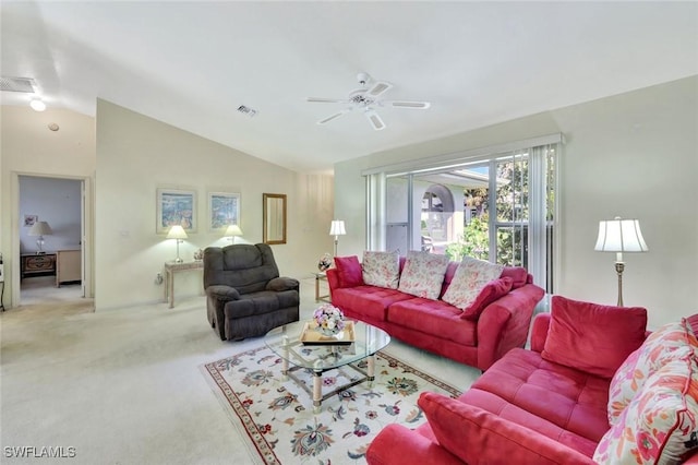 carpeted living area with visible vents, a ceiling fan, and lofted ceiling