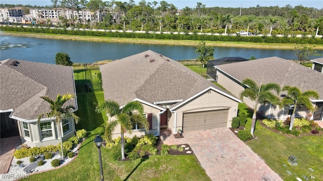 drone / aerial view with a water view