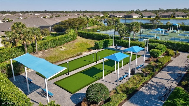 birds eye view of property featuring a residential view and a water view