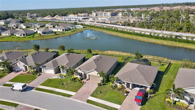 aerial view with a residential view and a water view